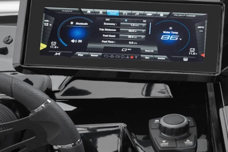 Slide: The Image of Dashboard of 2026 Yamaha Boats 255XE, featuring advanced touchscreen controls and steering wheel. - 6
