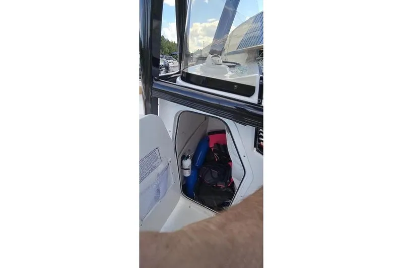 Slide: The Image of Yamaha display on 2023 Sea Hunt Ultra 234 showing fuel usage and trip data. - 10