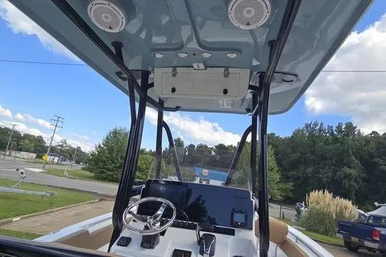 Slide: The Image of 2023 Sea Hunt Ultra 234 boat with a Prodan anchor system on deck. - 12