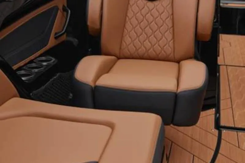 Slide: The Image of Luxurious seating on 2026 Yamaha Boats 255XD with tan and black upholstery. - 3