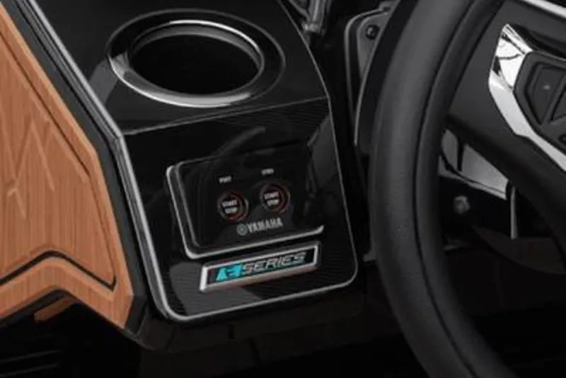 Slide: The Image of Dashboard of 2026 Yamaha Boats 255XD with sleek controls and cup holder. - 5