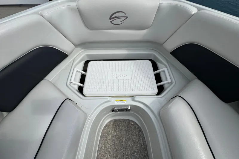 Slide: The Image of Interior of 2015 Crownline 285 SS boat with Igloo cooler storage. - 21