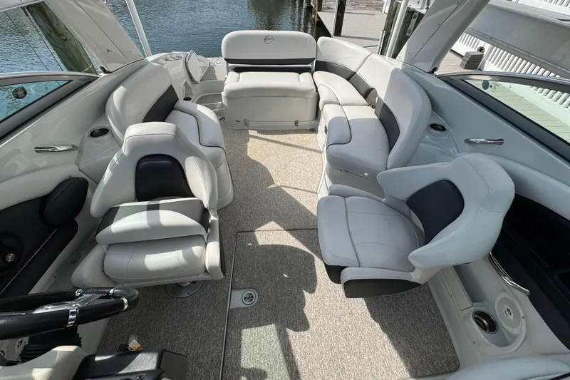 Slide: The Image of 2015 Crownline 285 SS boat interior with luxurious seating and modern design. - 25