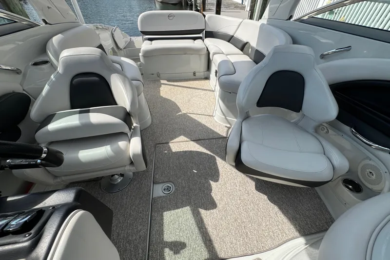Slide: The Image of 2015 Crownline 285 SS boat interior with plush seating and modern design. - 30