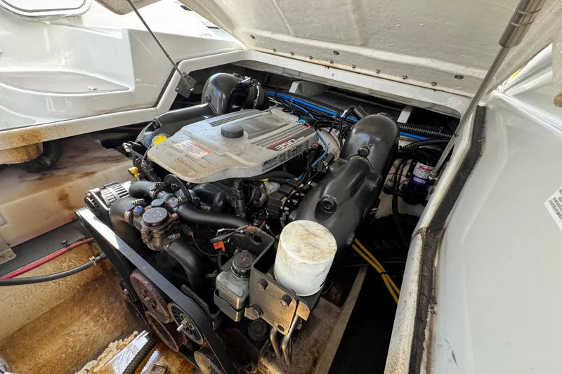 Slide: The Image of Engine compartment of a 2015 Crownline 285 SS boat, showcasing detailed mechanical components. - 39