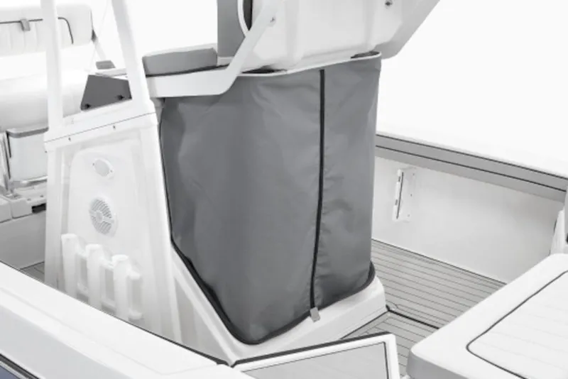 Slide: The Image of 2026 Yamaha Boats 195 FSH Sport interior with storage compartment and seating. - 3