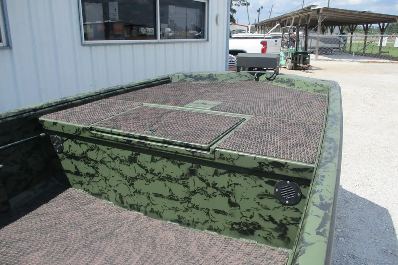 Slide: The Image of 2026 Gator Tail 1860 Extreme CC boat with camouflage design, parked outdoors. - 5