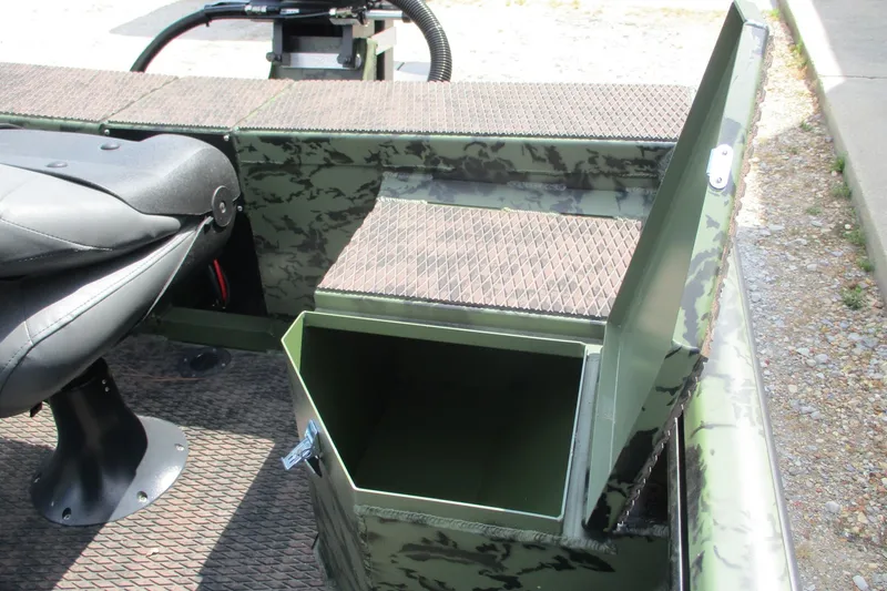 Slide: The Image of 2026 Gator Tail 1860 Extreme CC boat interior with storage compartment and seat. - 8