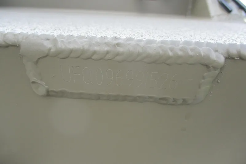 Slide: The Image of Close-up of 2026 Gator Tail 1748 GATOR hull identification number. - 10