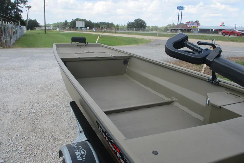 Slide: The Image of 2026 Gator Tail 1748 GATOR boat on trailer, parked on gravel road. - 3
