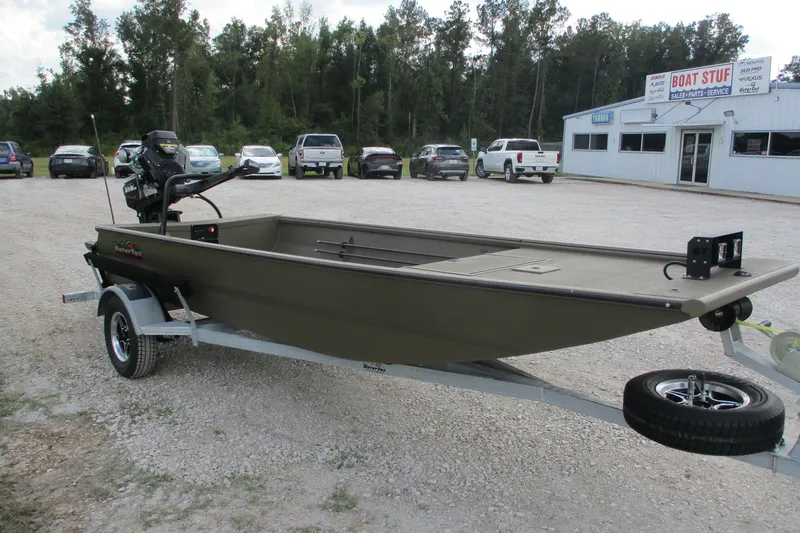 Slide: The Image of 2026 Gator Tail 1748 GATOR boat on trailer in parking lot. - 4