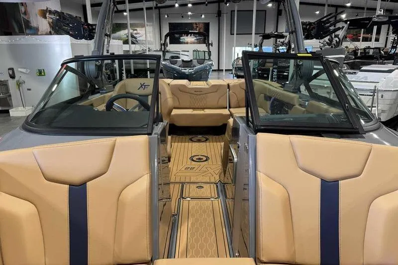 Slide: The Image of Interior view of 2026 MasterCraft XT22 boat with luxurious features. - 17