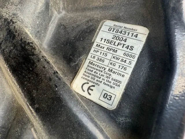 Slide: The Image of Champion 176 Fish Hunter with 2004 Mercury 115 Four Stroke 1990 - 18