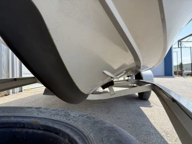 Slide: The Image of Champion 176 Fish Hunter with 2004 Mercury 115 Four Stroke 1990 - 9