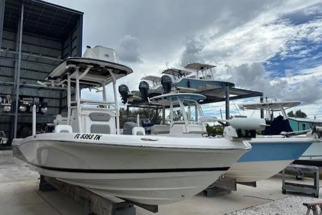 Slide: The Image of 2023 Caymas 26 HB boat in storage, showcasing sleek design and modern features. - 9