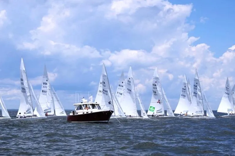 Slide: The Image of 2007 Legacy Yachts 32 amidst sailboats on a sunny day. - 11