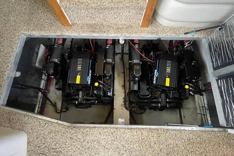 Slide: The Image of Engine compartment of 1997 Cruisers Yachts 3650 Aft Cabin with twin MerCruiser engines. - 36