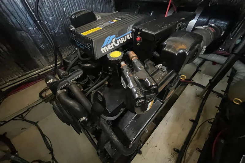 Slide: The Image of Engine of 1997 Cruisers Yachts 3650 Aft Cabin, featuring MerCruiser components. - 37