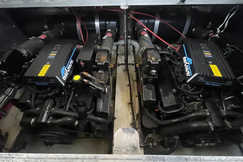 Slide: The Image of Twin MerCruiser engines in a 1997 Cruisers Yachts 3650 Aft Cabin boat. - 39