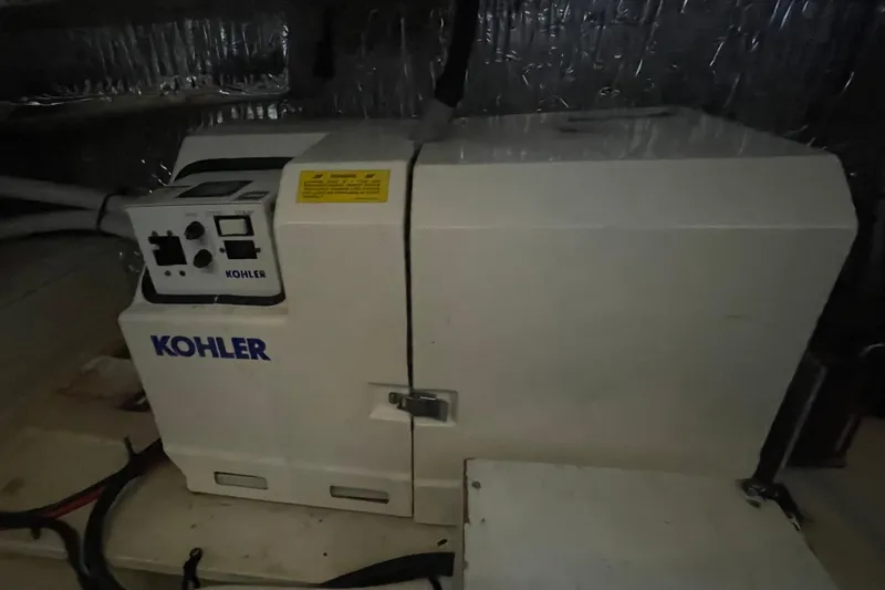 Slide: The Image of Kohler generator in 1997 Cruisers Yachts 3650 Aft Cabin engine room. - 40