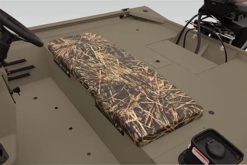 Slide: The Image of 2019 Tracker Grizzly 1860 CC boat interior with camo seat cushion. - 15