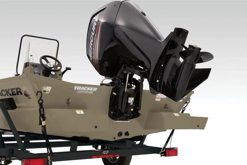 Slide: The Image of 2019 Tracker Grizzly 1860 CC boat with Mercury outboard motor on trailer. - 27