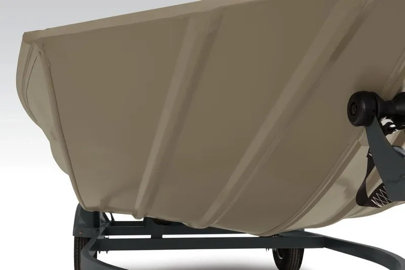 Slide: The Image of 2019 Tracker Grizzly 1860 CC boat hull on trailer, beige color, close-up view. - 28