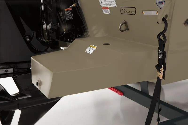 Slide: The Image of 2019 Tracker Grizzly 1860 CC boat transom with safety labels and motor mount. - 30
