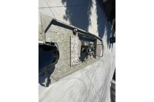 Slide: The Image of 2019 Tracker Grizzly 1860 CC boat on concrete surface, top view. - 8