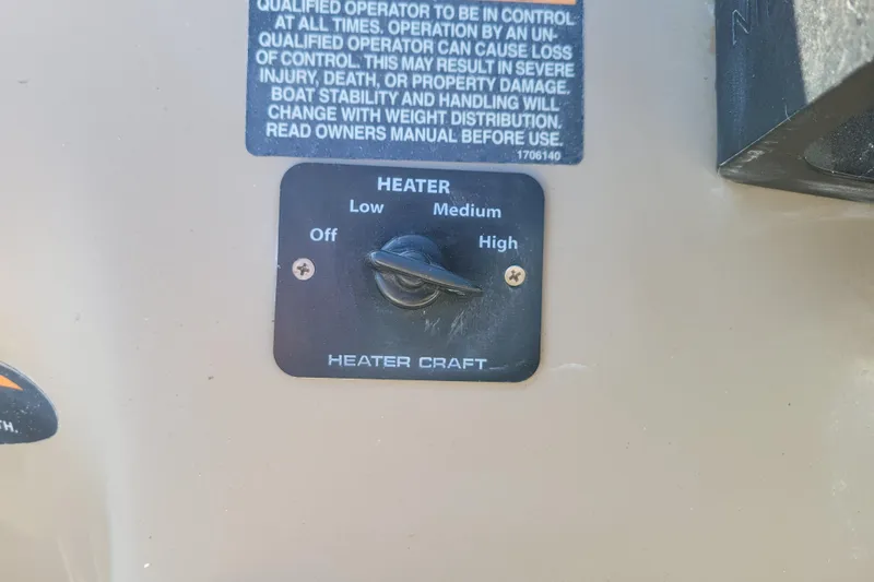 Slide: The Image of Heater control panel on a 2003 Bayliner 245 boat, showing settings from Off to High. - 16