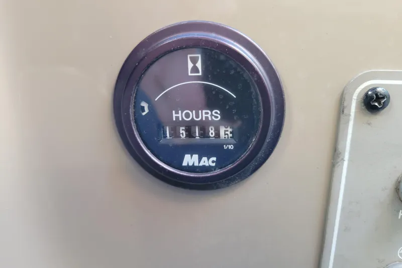 Slide: The Image of Hour meter showing 1518.5 hours on 2003 Bayliner 245 boat. - 35