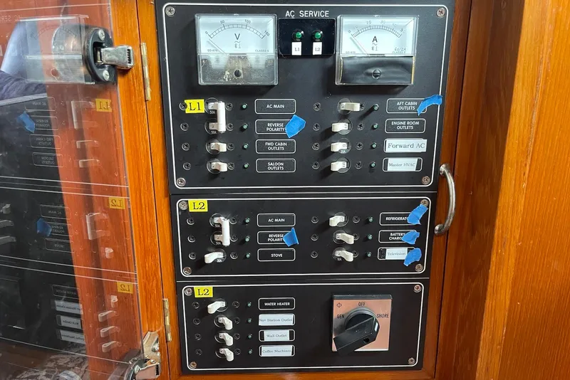 Slide: The Image of Compact bathroom in 2005 Mariner 38 Orient yacht with stainless steel sink and toilet. - 19