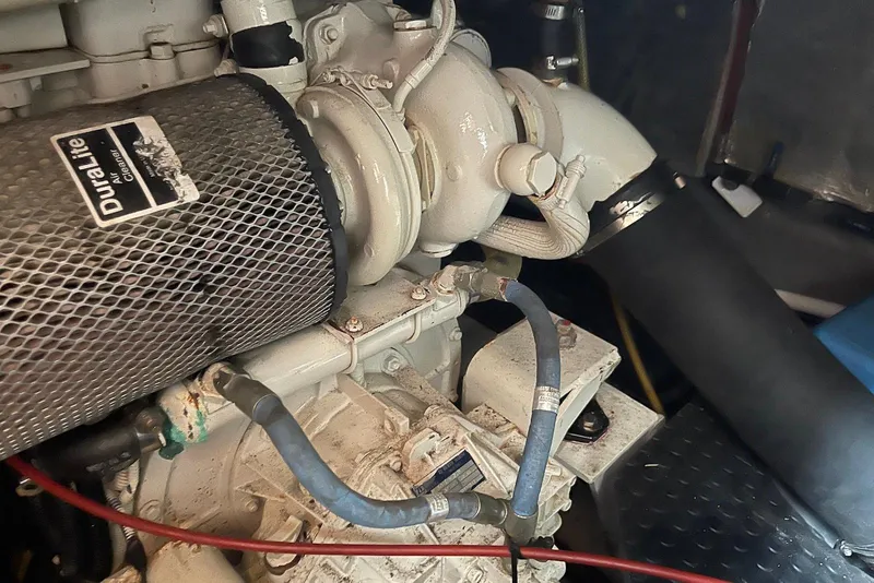 Slide: The Image of Compact bathroom in 2005 Mariner 38 Orient yacht with sink, toilet, and mirror. - 21