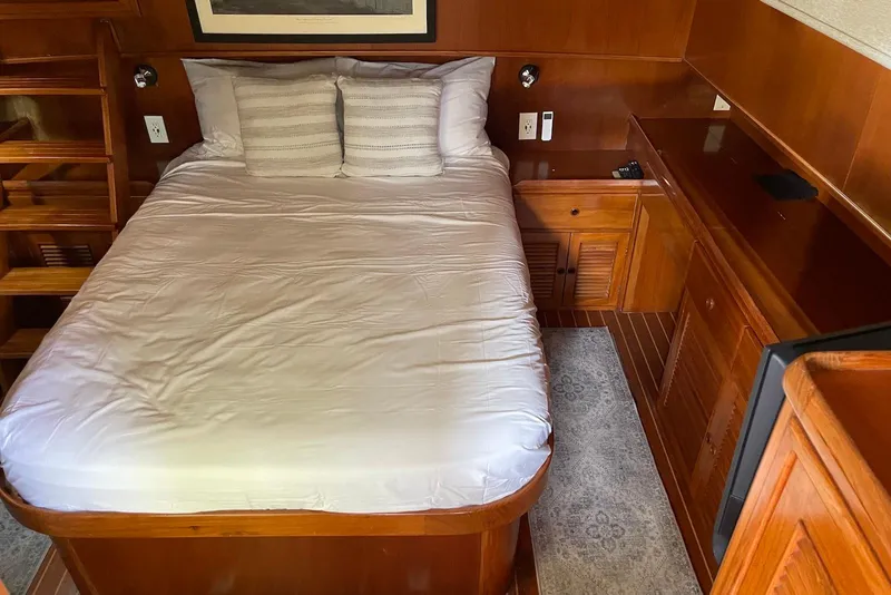 Slide: The Image of Helm of 2005 Mariner 38 Orient yacht with navigation equipment and steering wheel. - 6