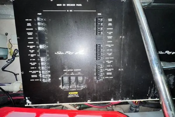 Slide: The Image of Main DC breaker panel of 2004 Sea Ray 390 Motor Yacht, featuring switches and controls. - 34