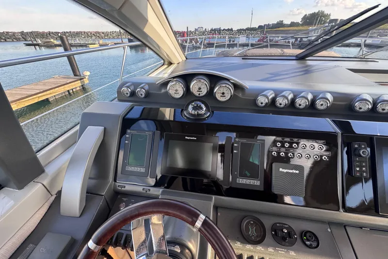 Slide: The Image of Cockpit of 2006 Azimut 68S yacht with navigation instruments and steering wheel. - 33