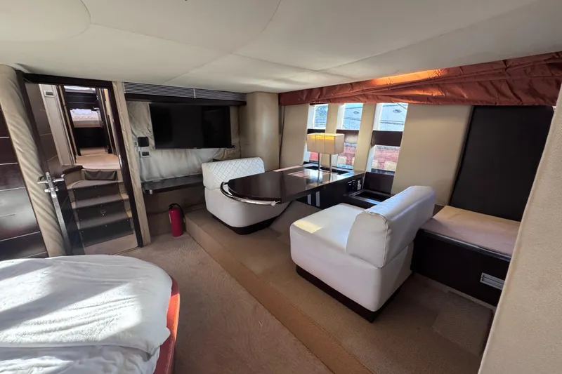 Slide: The Image of Luxurious interior of a 2006 Azimut 68S yacht with modern seating and elegant decor. - 71