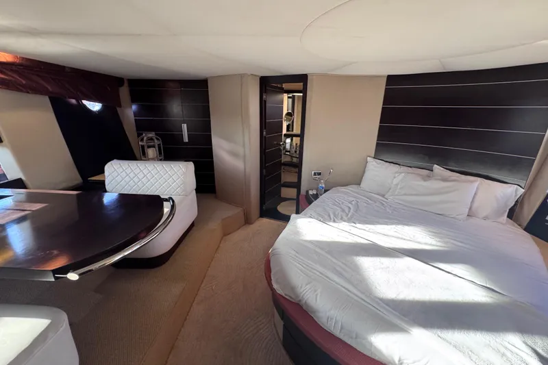 Slide: The Image of Luxurious interior of 2006 Azimut 68S yacht with bed and dining area. - 73