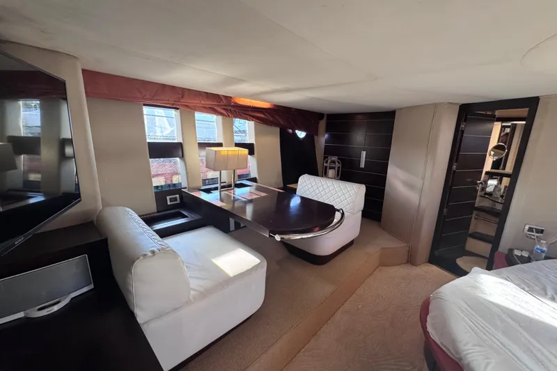 Slide: The Image of Luxurious interior of 2006 Azimut 68S yacht with elegant seating and modern decor. - 84