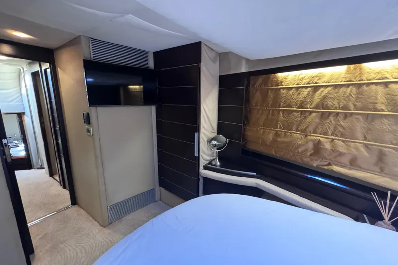 Slide: The Image of Luxurious interior of 2006 Azimut 68S yacht with modern design and ambient lighting. - 86