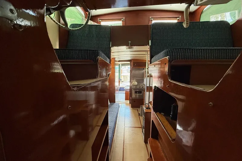 Slide: The Image of Gas heater inside a 1963 Wiley Trawler, showcasing blue flame and control knob. - 19