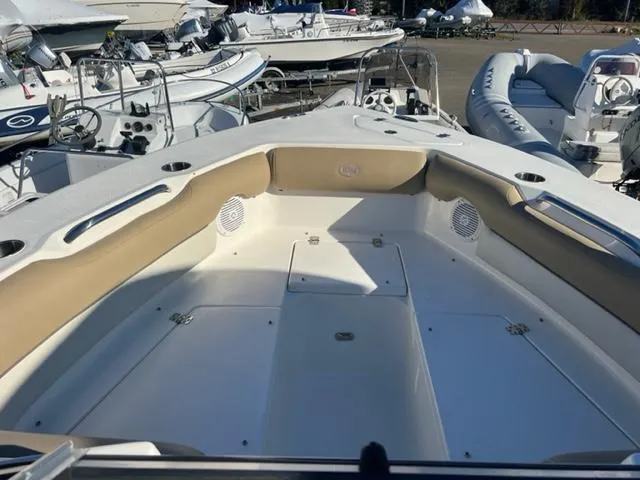 Slide: The Image of 2020 Key West 239 DFS boat interior with seating and storage compartments. - 10