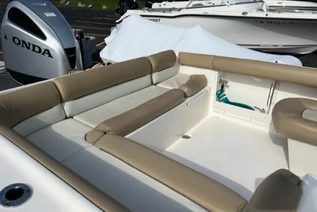 Slide: The Image of 2020 Key West 239 DFS boat interior with beige and white seating. - 5