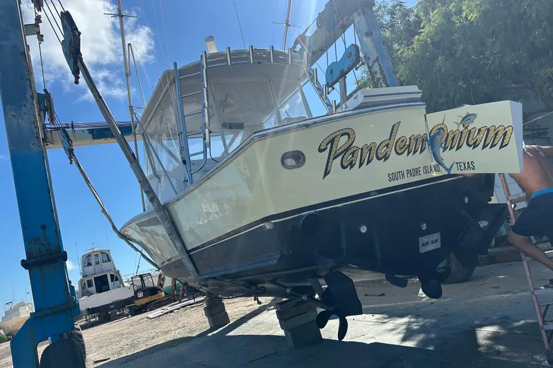 Slide: The Image of 1983 Hines-Farley 34 Express boat named "Pandemonium" in dry dock, South Padre Island, Texas. - 3