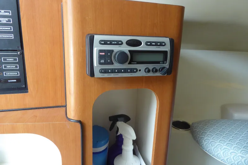 Slide: The Image of 2006 Hydra-Sports Vector 2900 VX cabin with stereo system and control panel. - 19