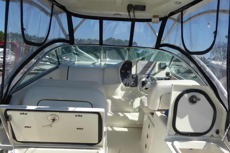 Slide: The Image of 2006 Hydra-Sports Vector 2900 VX boat interior with steering and navigation equipment. - 23