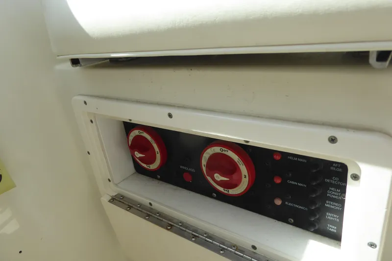 Slide: The Image of Control panel of a 2006 Hydra-Sports Vector 2900 VX boat, featuring switches and dials. - 30