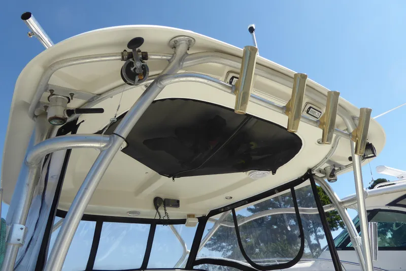 Slide: The Image of 2006 Hydra-Sports Vector 2900 VX boat with rod holders and canopy, viewed from below. - 33