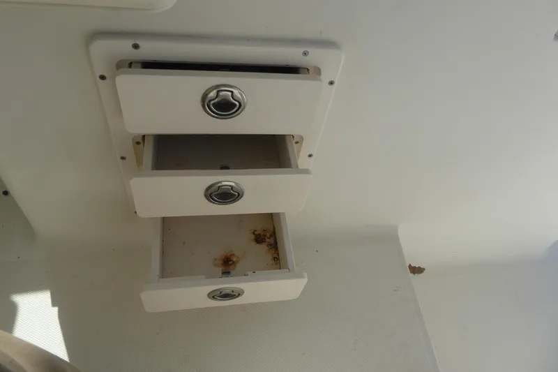 Slide: The Image of Open storage drawers on a 2006 Hydra-Sports Vector 2900 VX boat. - 37