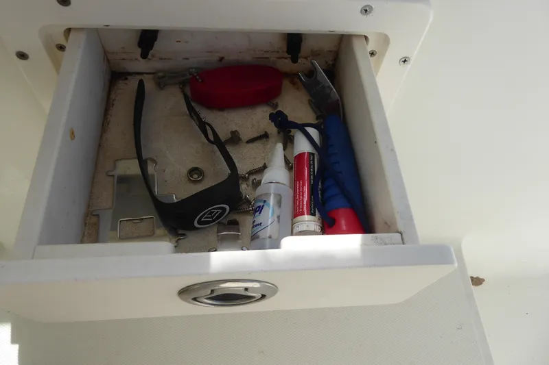 Slide: The Image of Open drawer with tools and accessories on a 2006 Hydra-Sports Vector 2900 VX boat. - 38